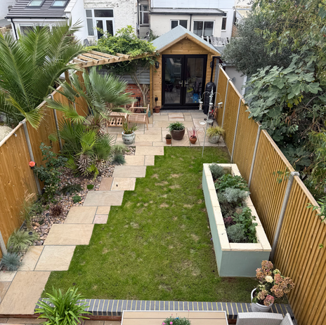 garden refurb staggered slabs turf fencing