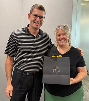 Friends President Brian Blackerby and Melissa celebrate her 10 years of service to the Friends.