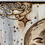 Thumbnail: Pyrography artwork: clouds, stars, and a face on wood