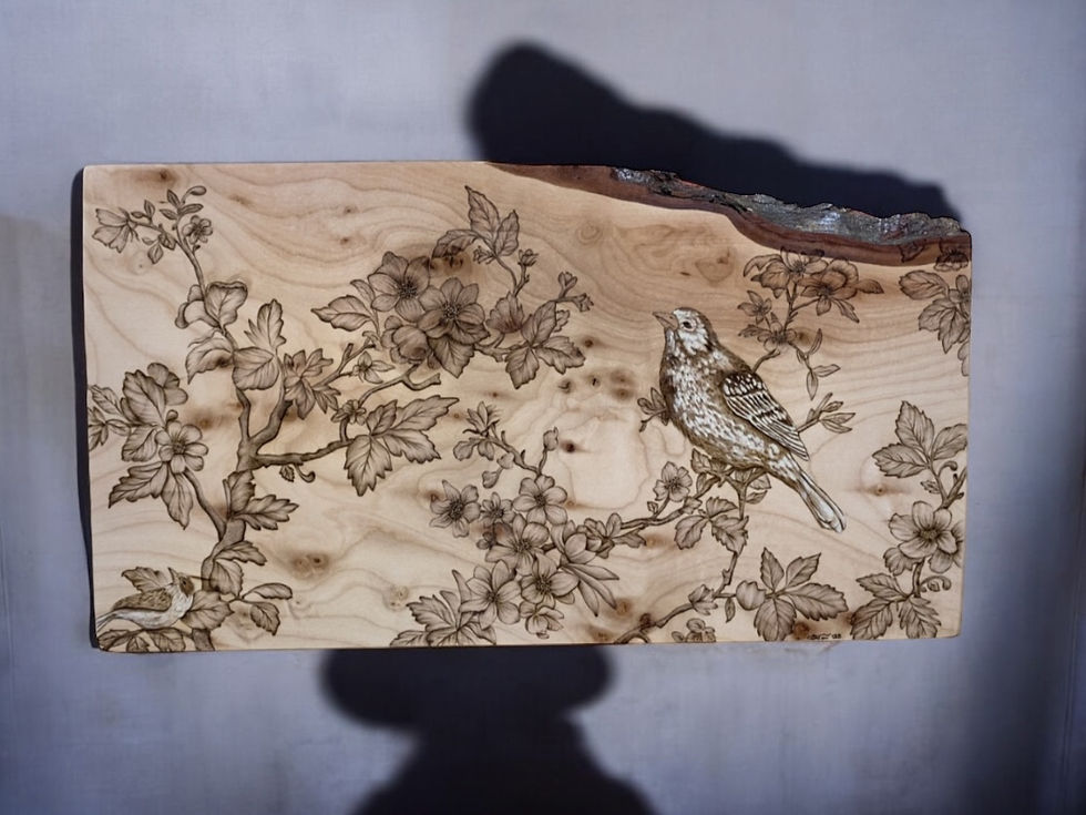 Thumbnail: Wood burned artwork: bird perched on flowering branch