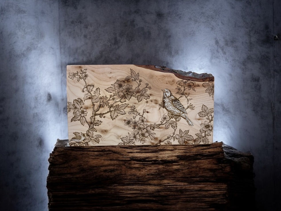 Thumbnail: Wood carving of bird on flowering branch