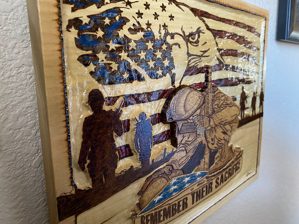 Thumbnail: Wooden carving of soldiers, eagle, and American flag; "Remember Their Sacrifice"