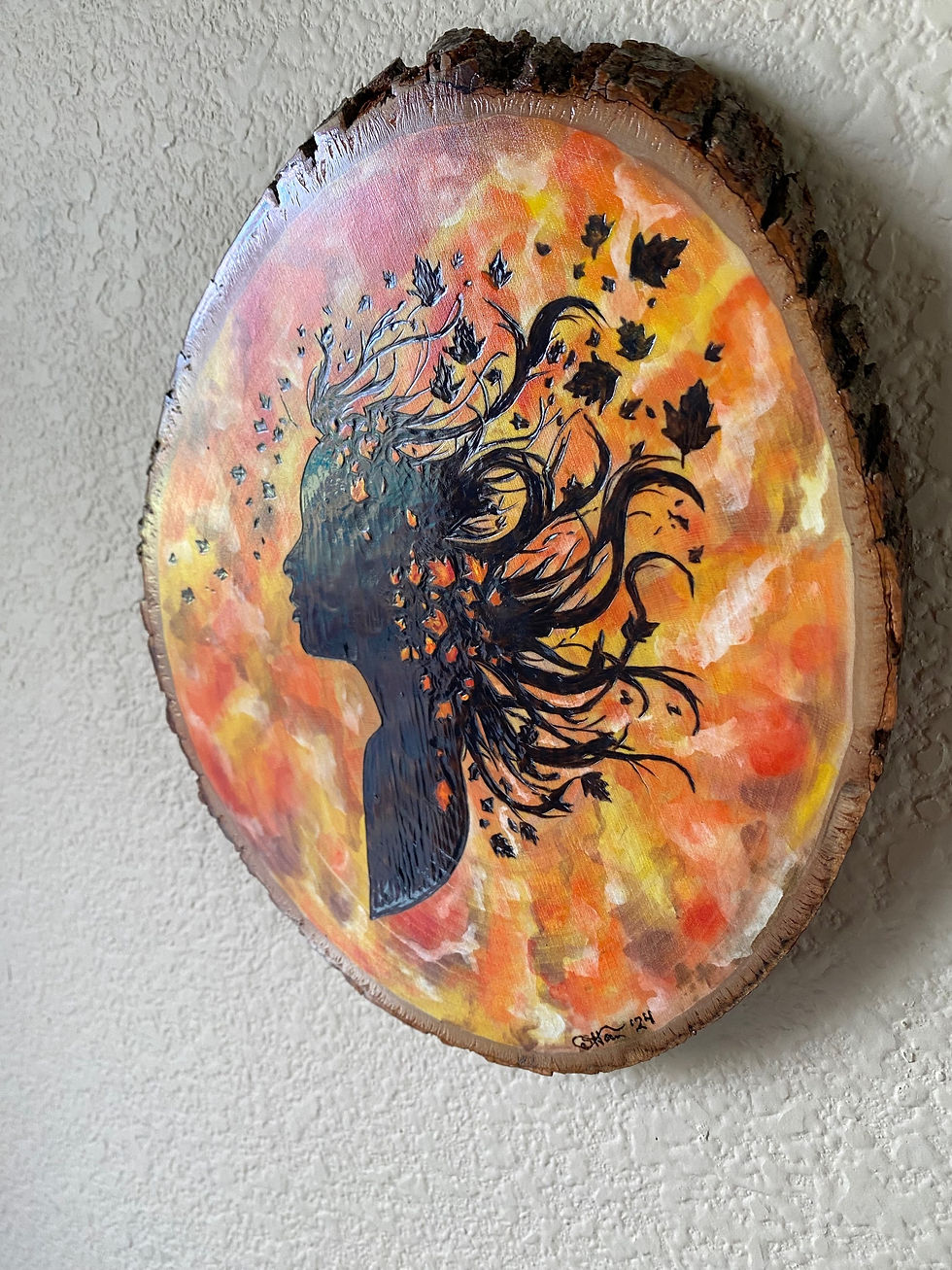 Thumbnail: Autumnal wood slice painting: woman's profile with leaves in hair