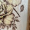 Thumbnail: close up view of Intricate wood-burned floral design