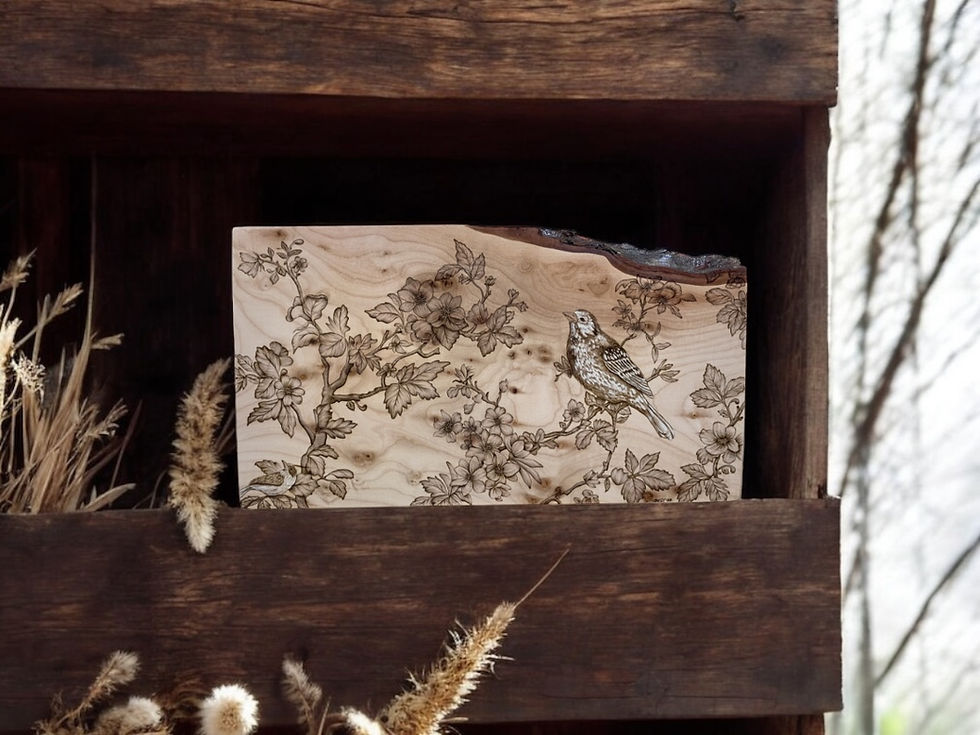 Thumbnail: Wood slice art: bird on flowering branch