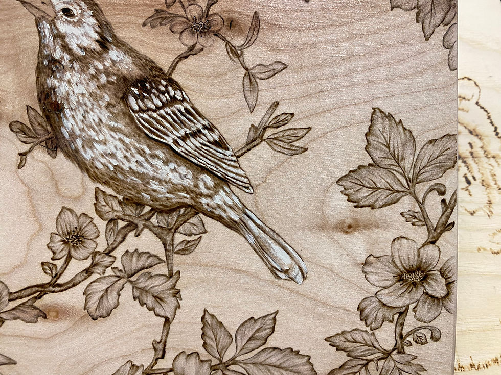 Thumbnail: Pyrography artwork: bird perched on flowering branch