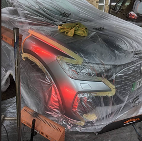 to repair this car bumper scuff we opted to polish and prime before repainting the entire quarter panel