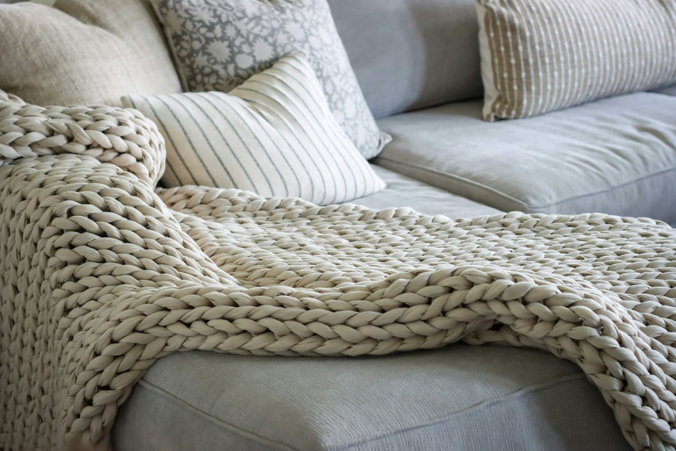 Weighted blanket draped on a couch