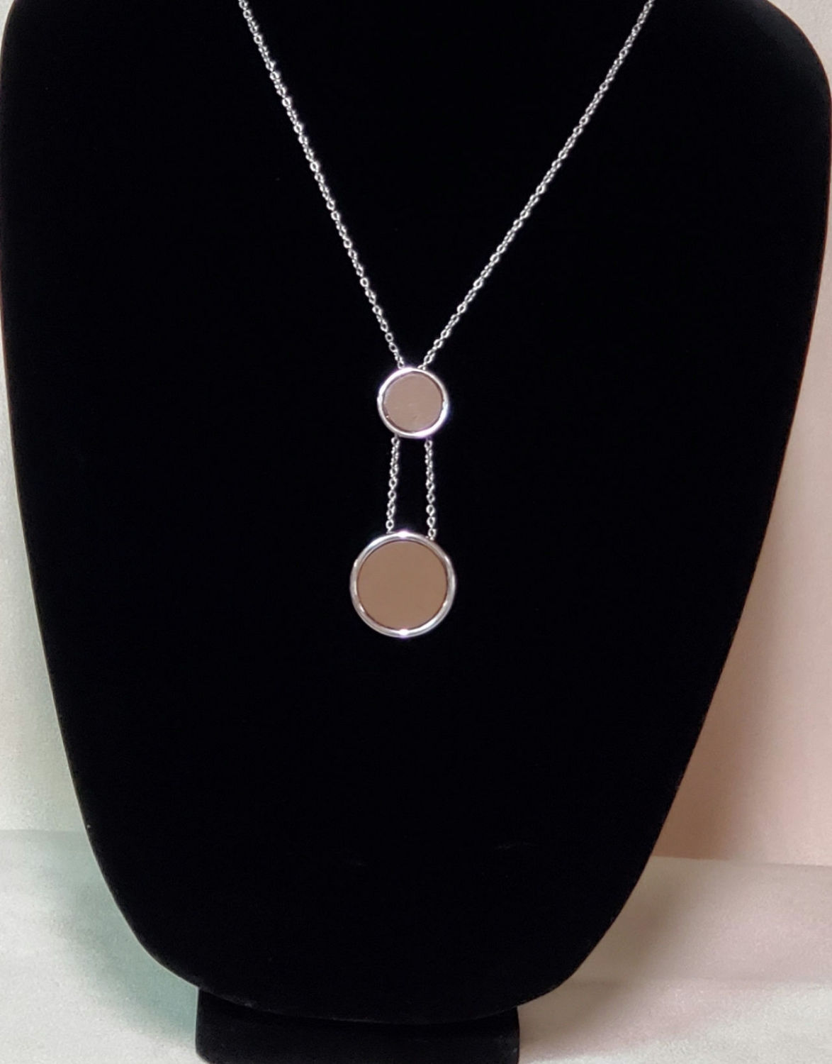 Wood medallions set in silver-tone circles 1" by 3/4" inch pendent 27" chain
