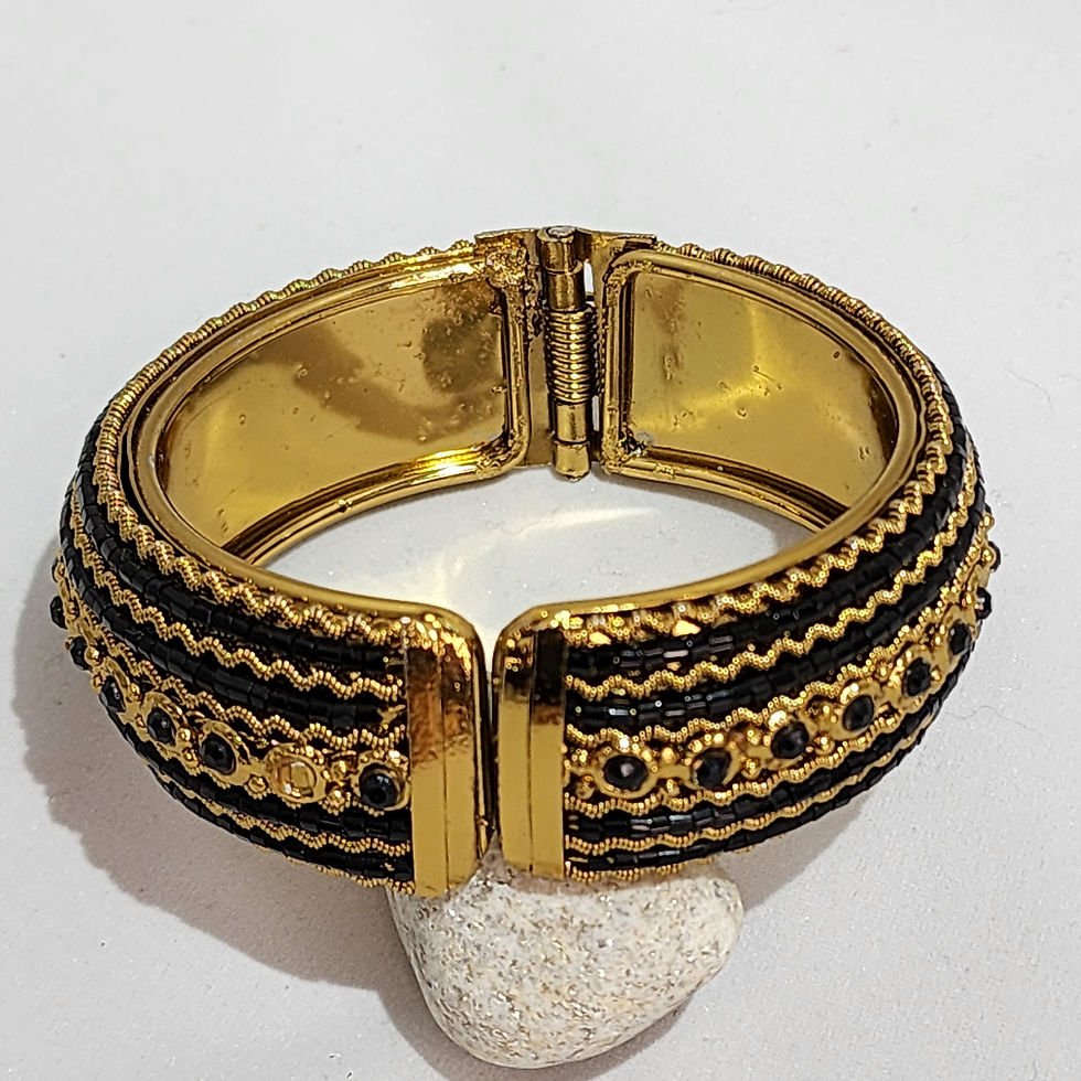 Thumbnail: Gold-tone filigree hinged bracelet with  black seed beads and black rhinestones