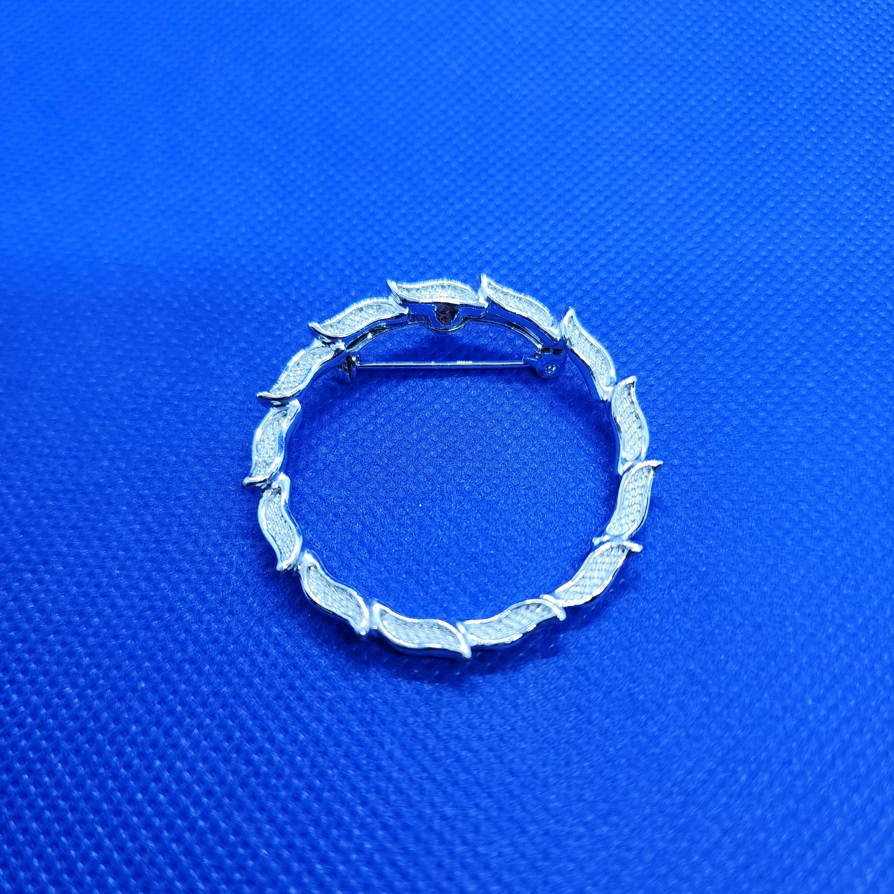 GERRY'S 1 1/2" inch vine designed silver-tone brooch