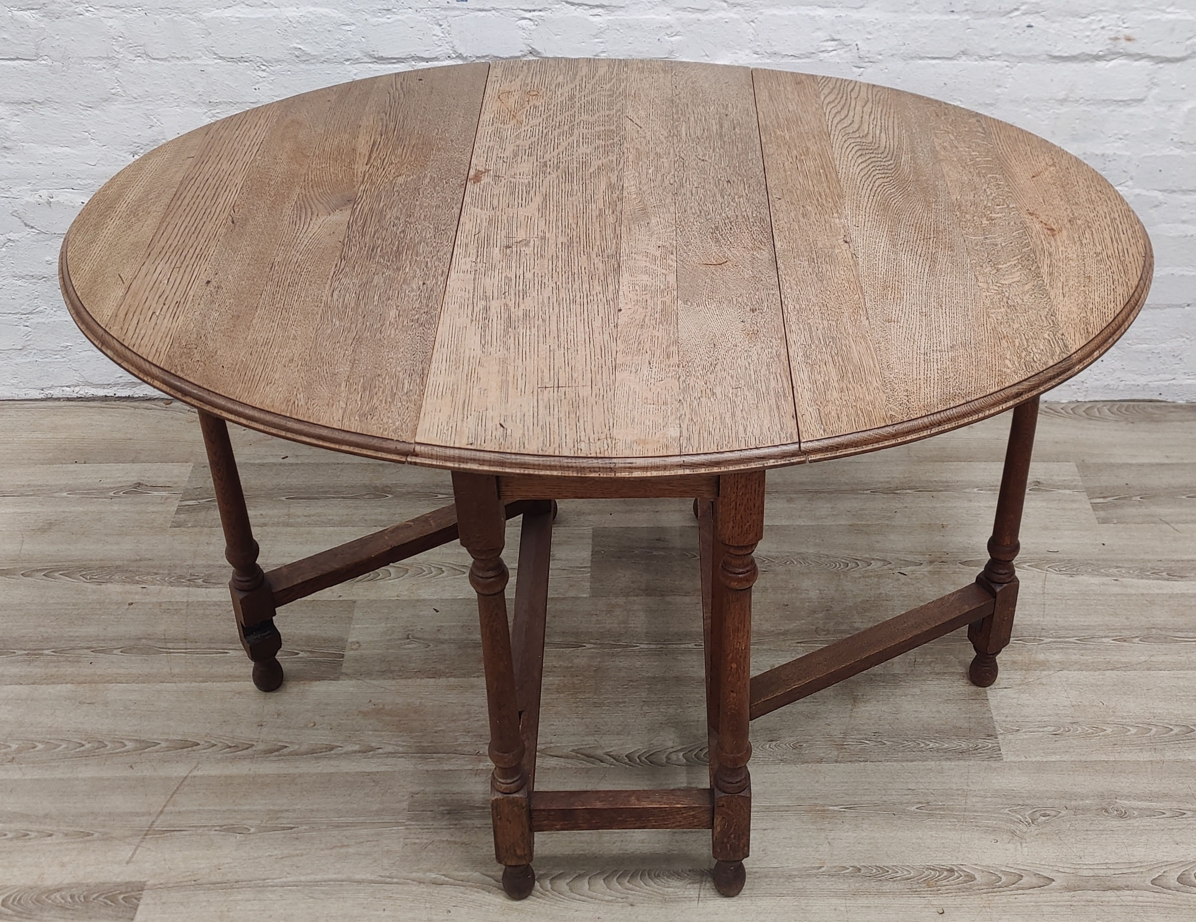 Early 20th century stripped oak gateleg dining table