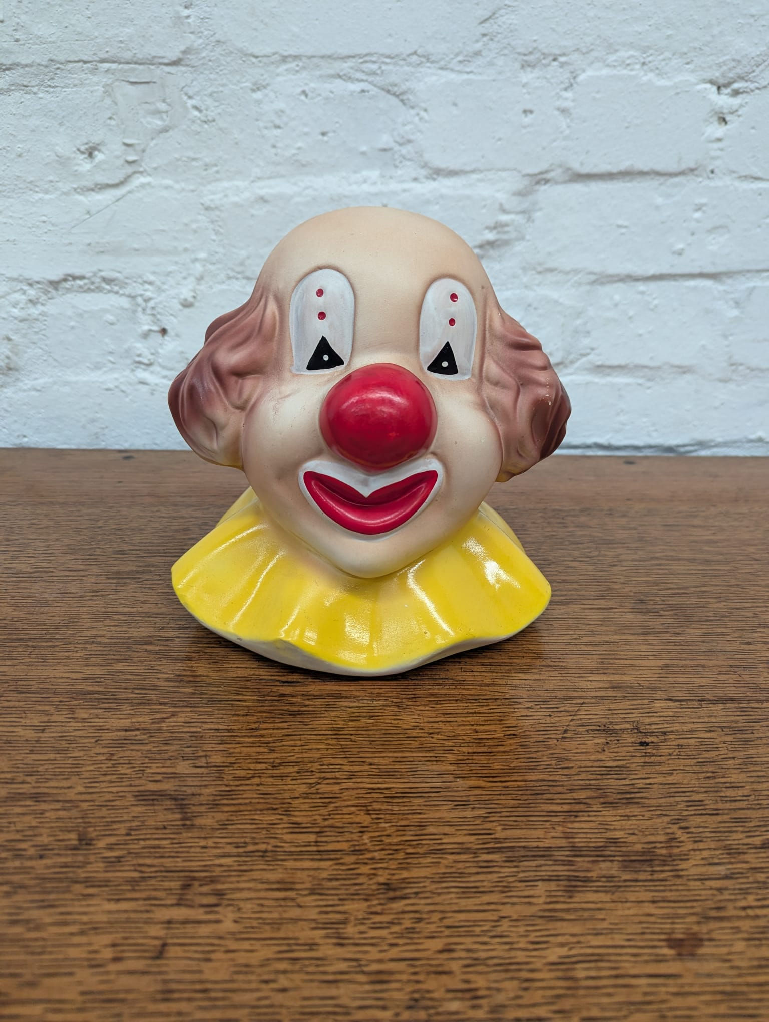 Vintage ceramic clown head piggy bank 