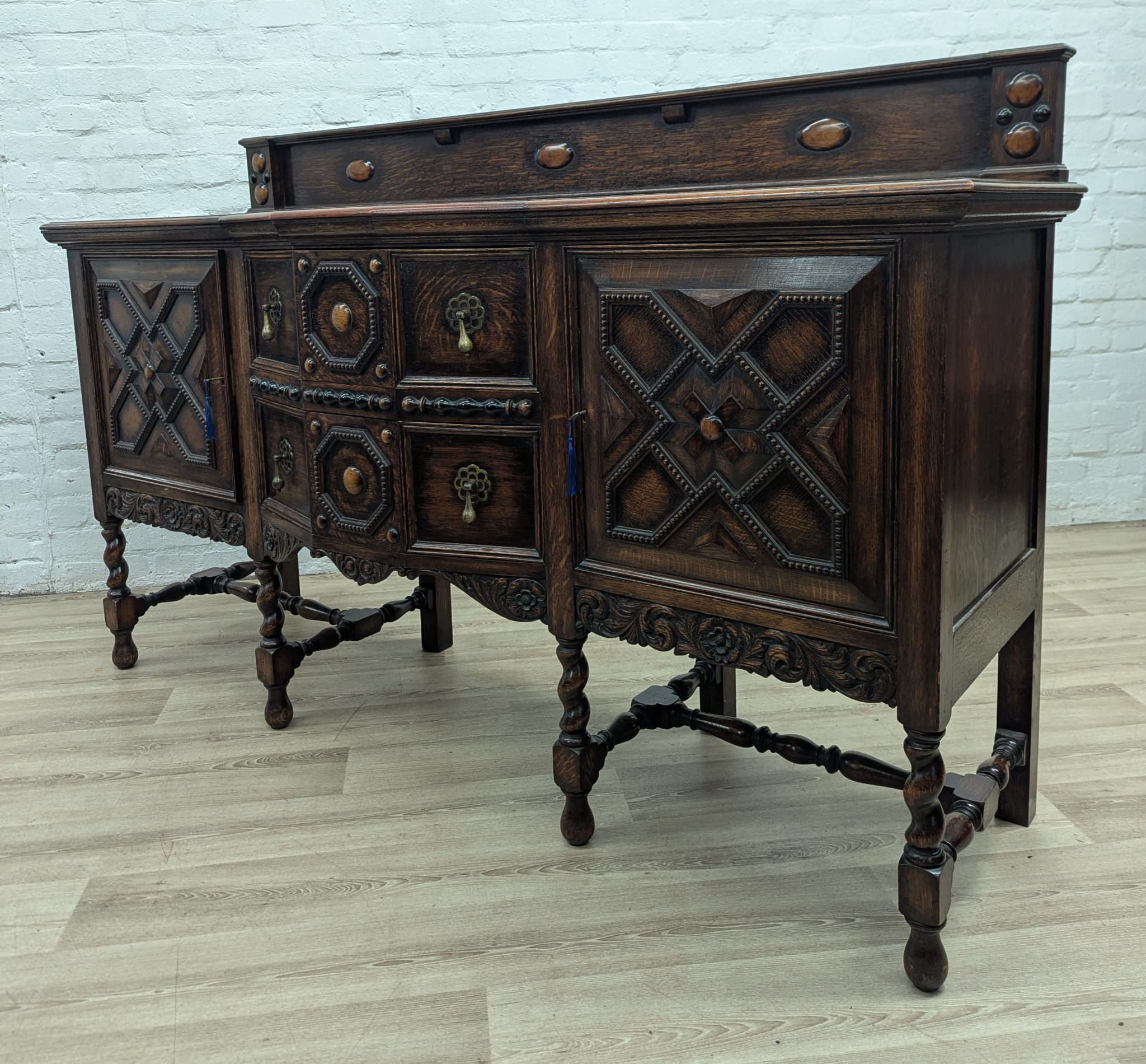 Early 20th century George V carved oak sideboard