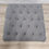 Thumbnail: Chesterfield style deep buttoned foot stool grey fabric