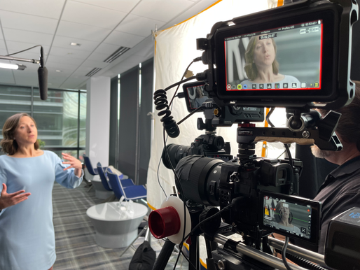 a lawyer being interviewed on camera at a law firm