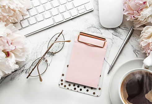 flat-lay-top-view-womens-office-desk-with-flowers.jpg