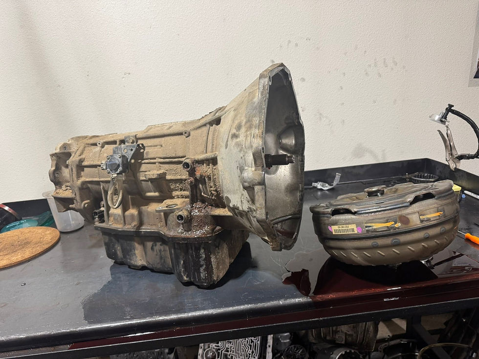 Torn apart 68RFE transmission waiting on table to be rebuilt