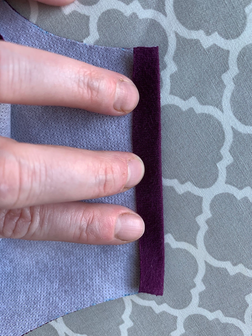 Press the straight edges down about 1/4" away from the edge on the Inside piece.