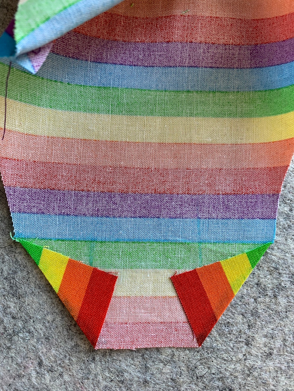 Using an iron, press the diagonal folds.