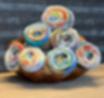 7 cakes of Fair Cotton Infinity in a wooden basket