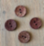 4 coconut buttons with a print