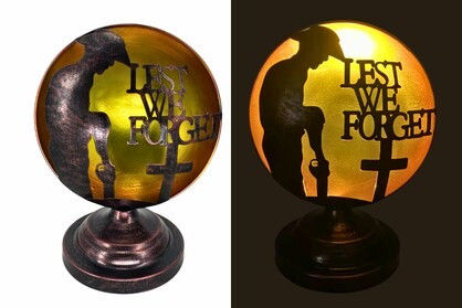 Lest we forget lamp soldier cross