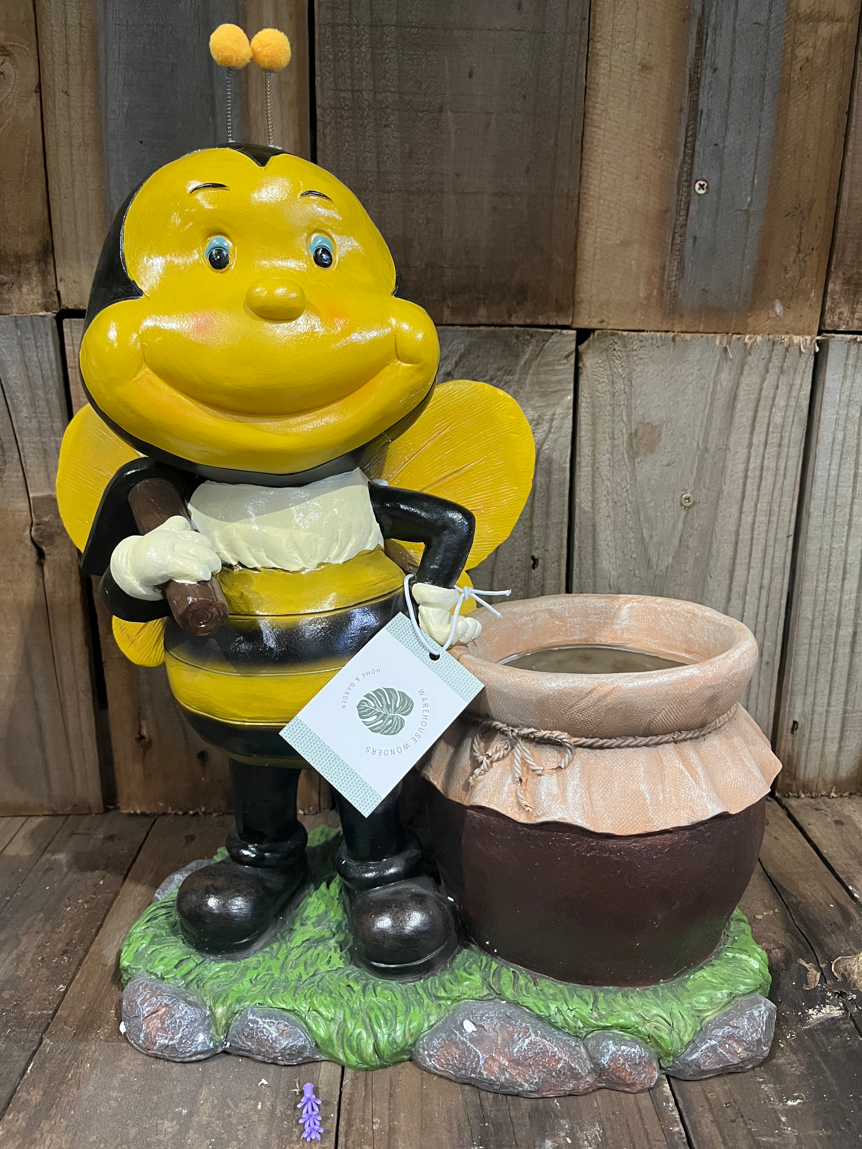 Bee Holding A Pick Pot