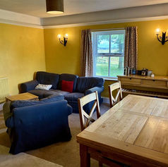 Twin room's living area with dining table