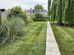 New turf laid with a path going down the middle