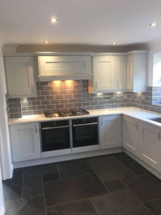 A recently installed or refurbished kitchen featuring a contemporary design