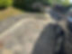 A car parked on a driveway