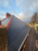 Pitched roof being installed with scaffold