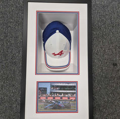 Framed racing memorabilia