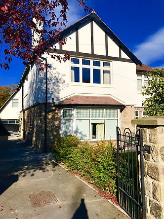 Detached home with newly applied thin coat render system