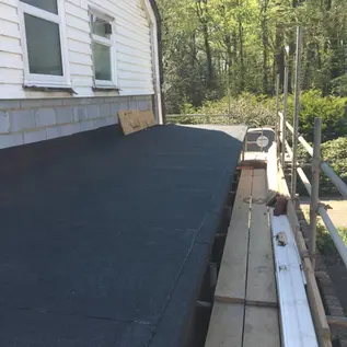 New felt roof with scaffolding