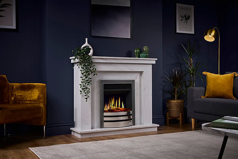 White fireplace surround with inset gas fire in a dark blue living room