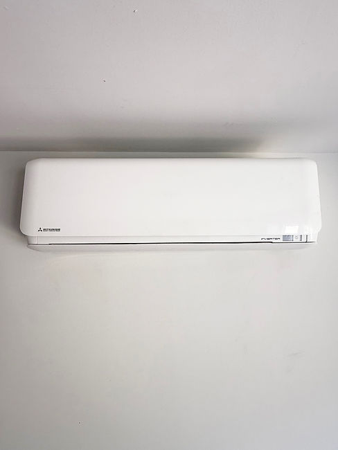 White Mitsubishi wall-mounted mini-split air handler unit