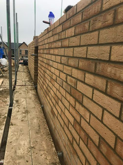 House wall with gap for a door