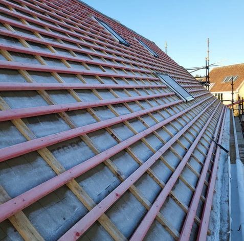 Timber battens and roof membrane installed on roof pitch prior to tiling