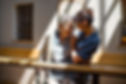 An elderly woman and her carer laughing together.jpg