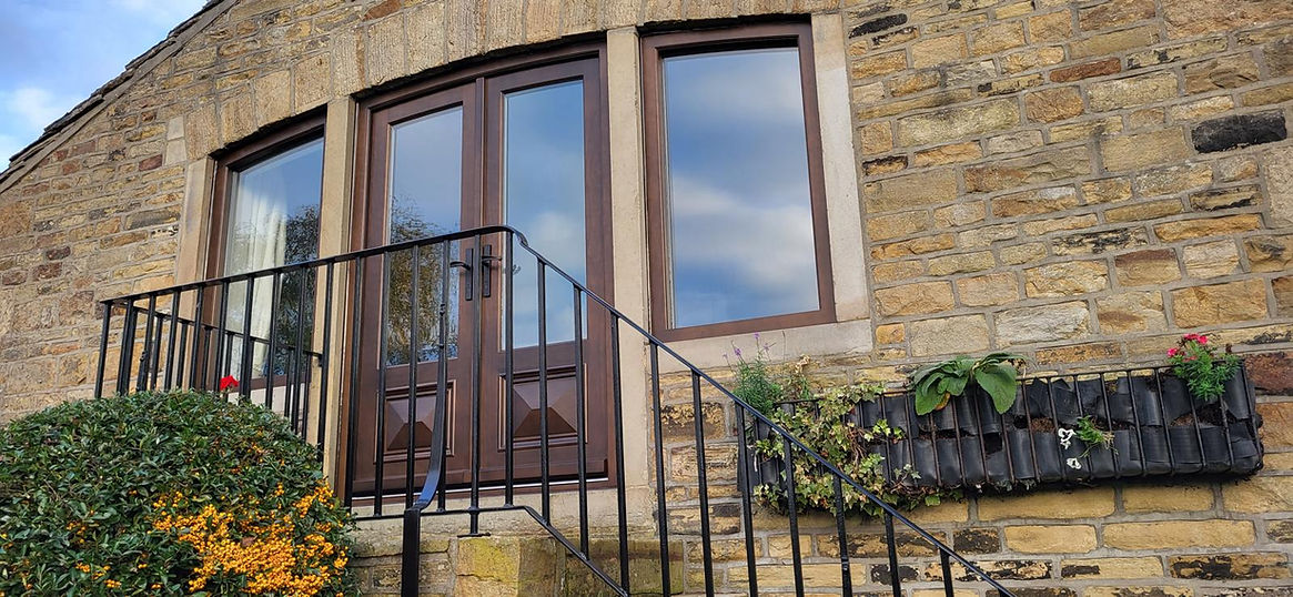 New door with windows installed to the left and right