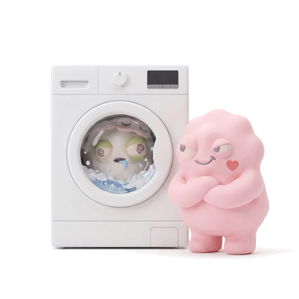 Devie putting Dozie into the washing machine