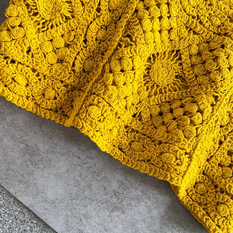 Thumbnail: zoomed in detailing of the bottom of crochet camisole