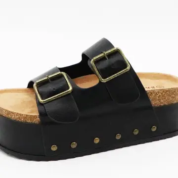 black leather platform sandal buckles on strap