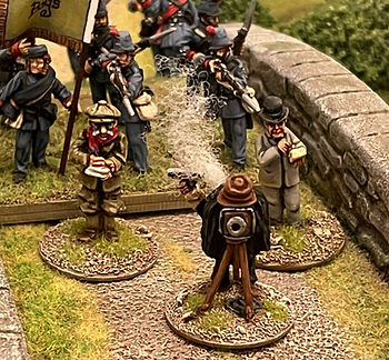 Harry 'Flashbang' Whallop and his crew are on a bridge taking photos of the battle that's going to unfold