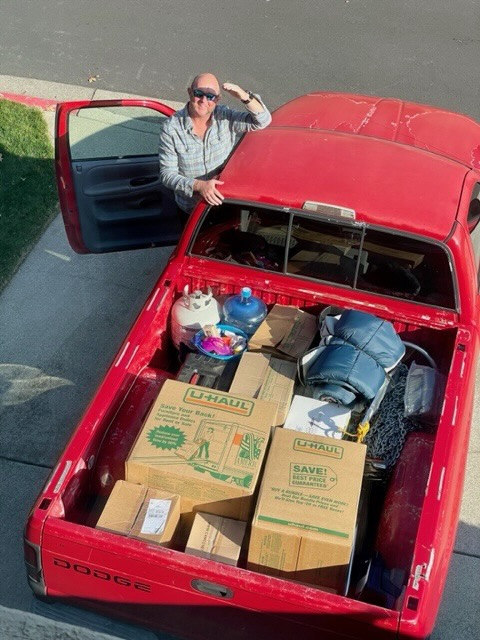 André Lay prepping gear and equipment for coastal cruising aboard the SeaPiper trawler.