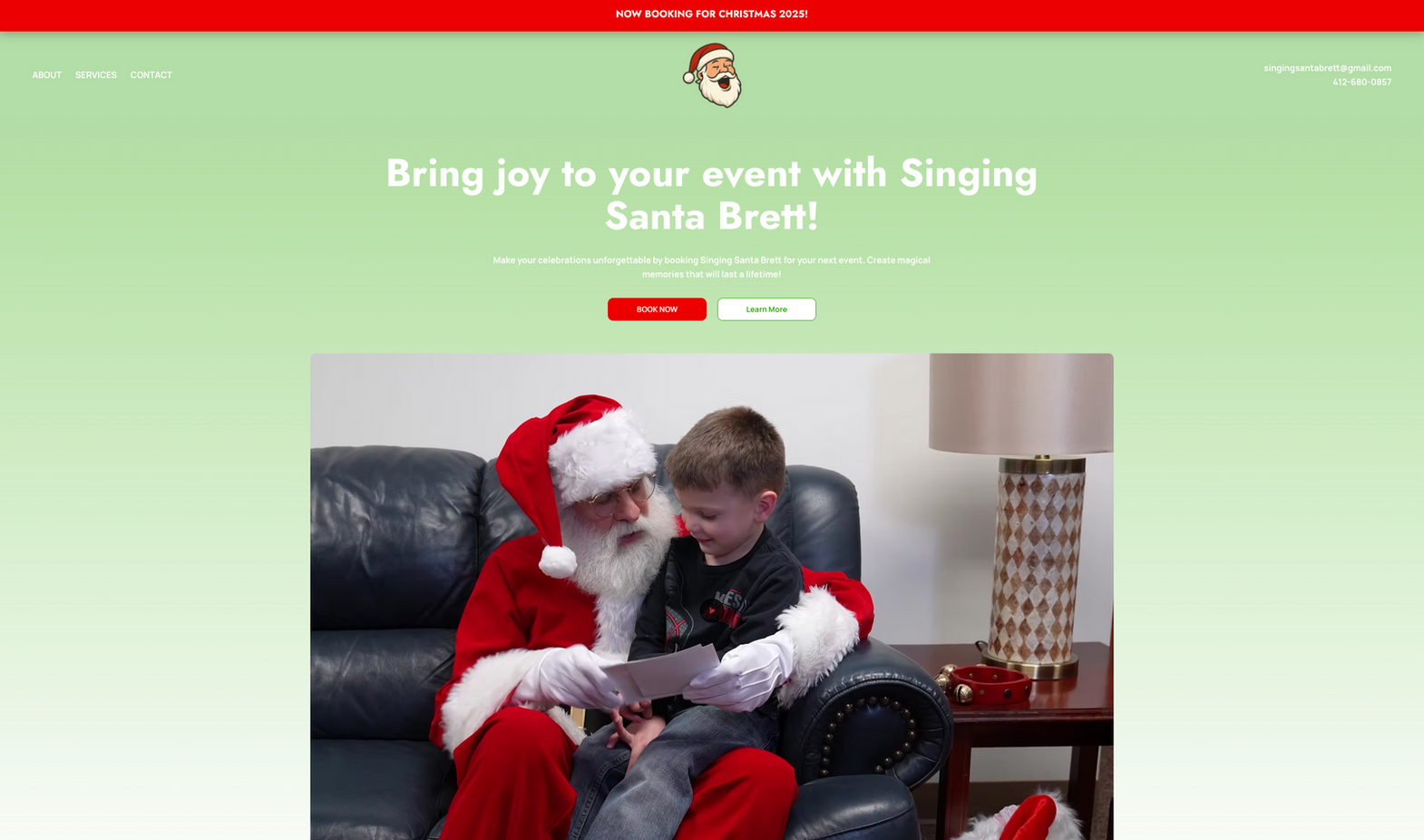 Singing Santa Brent with child on lap