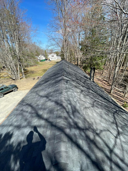 Residential asphalt shingle roof replacement in progress