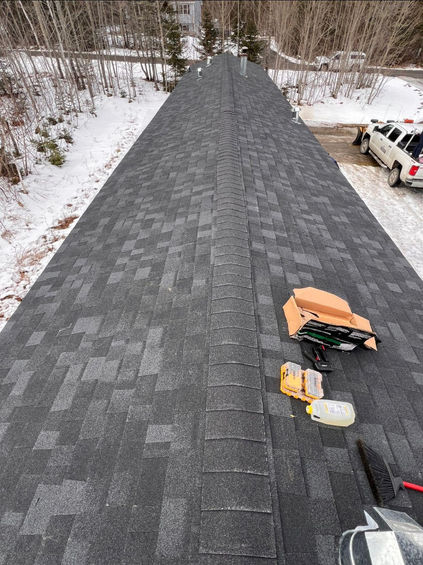Completed architectural shingle roof installation